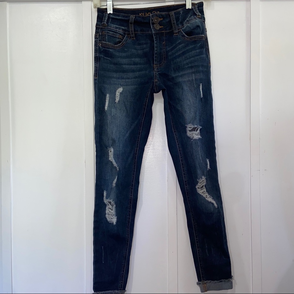 blue ripped jeans